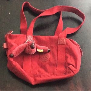 Kipling red purses